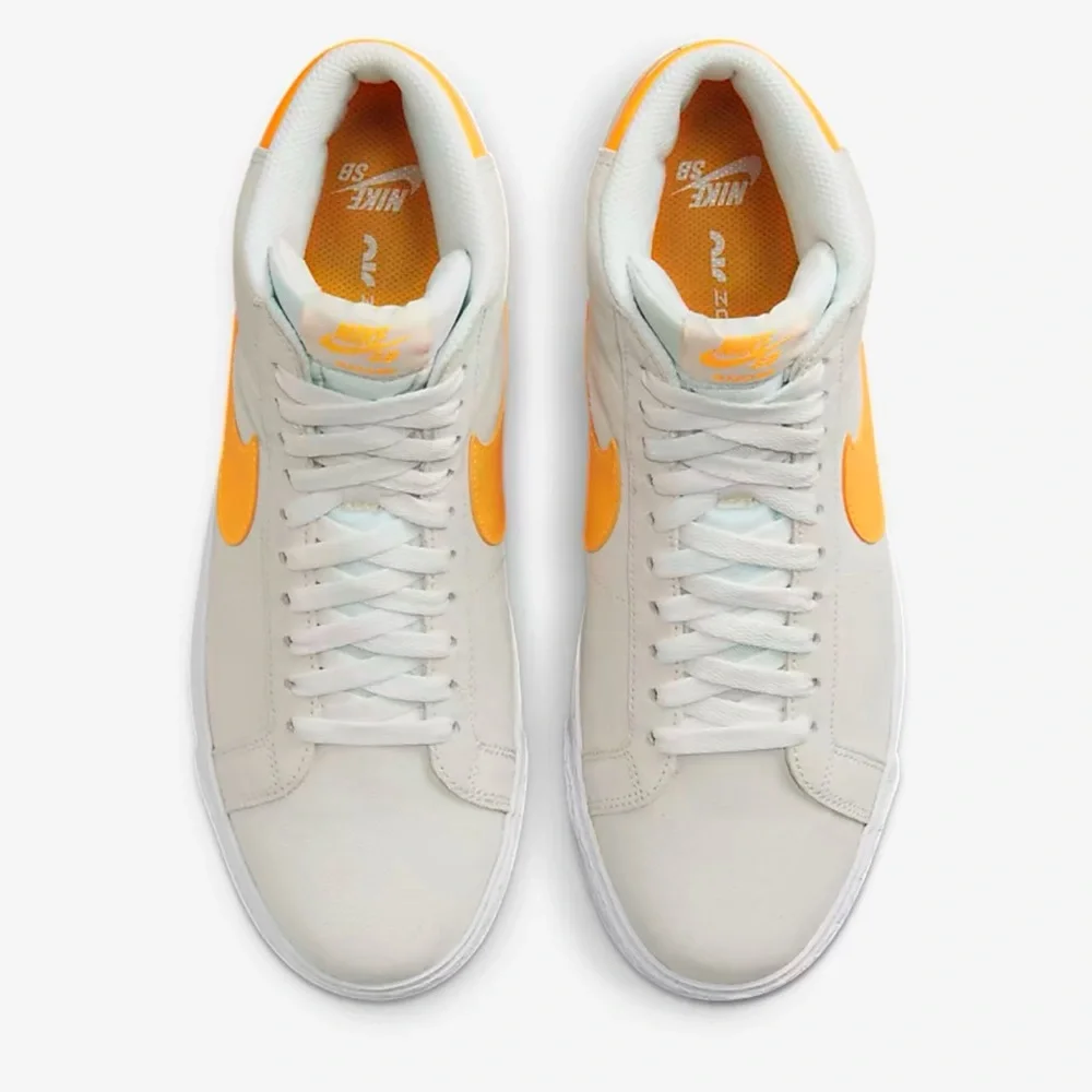 Nike Men’s SB Zoom Blazer Mid
Summit White/Summit White/Laser Orange
Skate Shoes - Picture 12 of 16